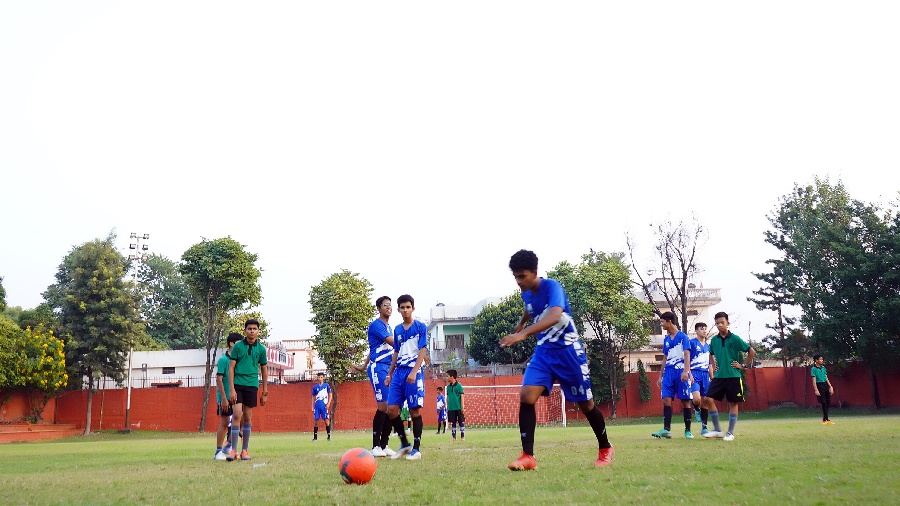 Students Playing Football